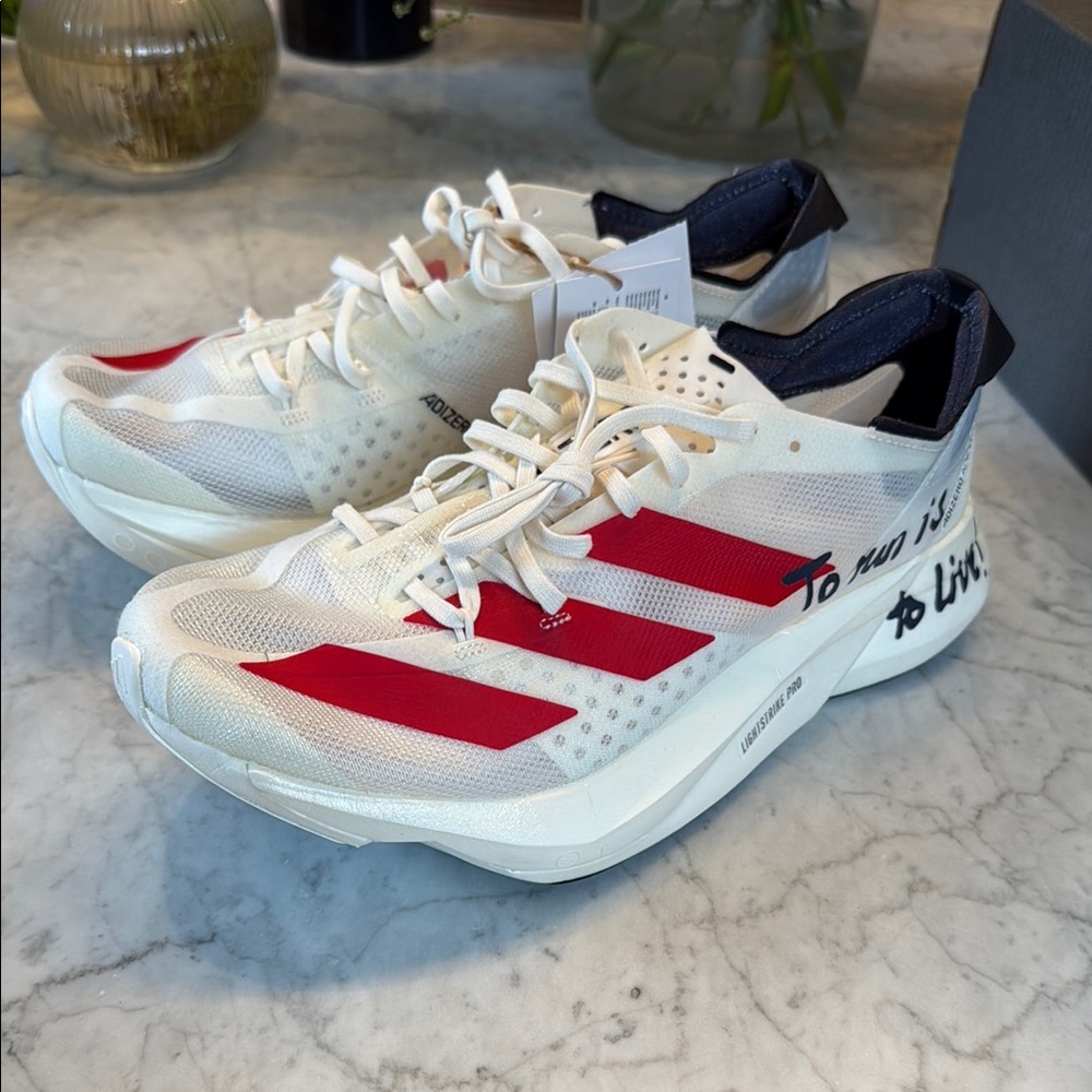 Adidas Adizero Adios Pro RW5 (men’s 6.5 / women’s 7.5)